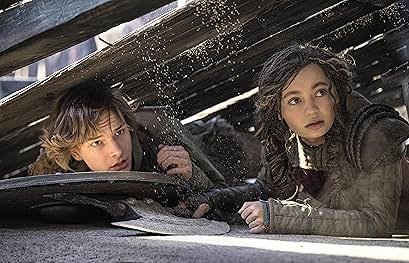 Soluço e Astrid em Como Treinar o Seu Dragão, uma parceria épica no mundo dos vikings.